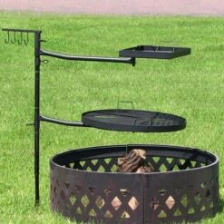 Sunnydaze Decor Sunnydaze Outdoor Camping Or Backyard Steel Adjustable Cooking Grilling Fire Pit BBQ Stake With 2 Swivel Swing Grates -Coleman Shop GUEST f0c0749c 9cc5 460f 91f7 d01012d2f322